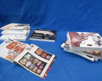 Lot 137. 11 Rock Island Armory auction catalogs. Fantastic firearms reference or pleasure reading with great pictures.