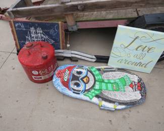 Lot 37. Snowmobile gas can, snow board, snowmobile ski trailer brackets, and more