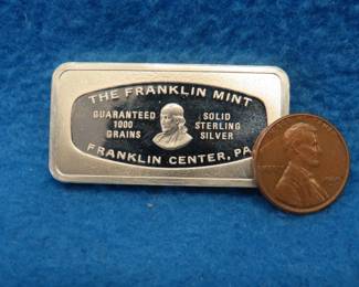 Lot 356. Franklin Mint Bank-marked sterling silver ingot. 65.61 grams
