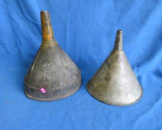 Lot 103. Two oil funnels