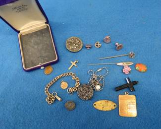 Lot 412. Jewelry box with contents including three gold-plated cuff links, 1937 Tacoma dog tag, stick pins and more