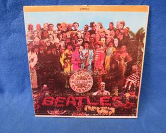 Lot 97. Beatles Sgt. Pepper album. Includes cut-out insert.