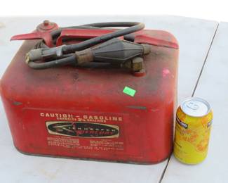 Lot 243. Three one-quarter-gallon Kiekhaefer Mercury boat gas can and hose