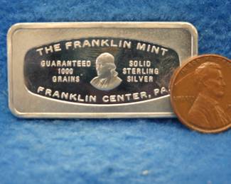 Lot 361. Franklin Mint Bank-marked sterling silver ingot. 66.02 grams