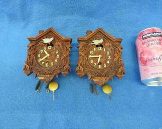 Lot 321. Two animated Lux bird clocks. No keys. Owner-printed info said they are good runners.