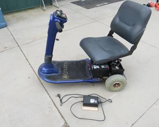 Lot 482. Golden Companion II mobility scooter with two brand new batteries. Includes the charger. Works great.