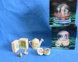 Lot 98. Two musical snow globes and Easter decorations