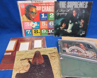 Lot 136. 12 vintage albums including Jerry Lee Lewis, Ray Charles, and more