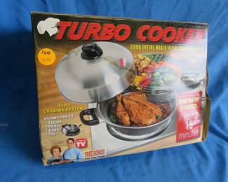 Lot 100. NIB Turbo cooker