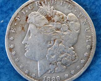 Lot 19. 1889 O Morgan silver dollar