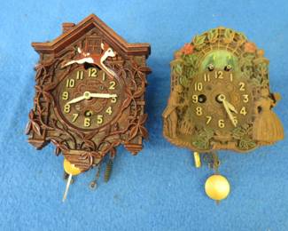 Lot 432. Two vintage animated wall clocks for parts or repair