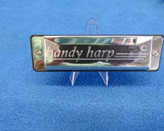 Lot 207. Handy Hering Harp model 4120 harmonica in the key of C in the box. Excellent condition.