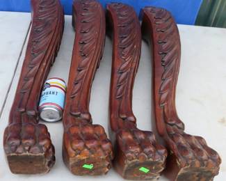 Lot 261. Four heavy corner table legs