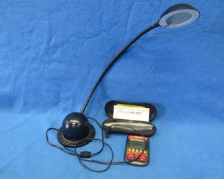 Lot 67. ColdHeat soldering tool and a Yahtzee game both are untested. Desk lamp.