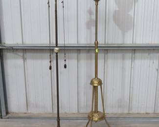 Lot 429. Two antique floor lamps, one is electric and one adjustable-height oil. The glass shade is cracked.