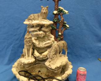 Lot 352. Wolf-themed resin water fountain. Owner states it works good.