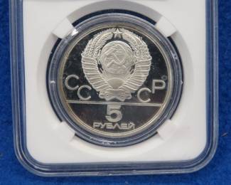 Lot 166. 1977 .999 silver 5 Ruble coin commemorating the 1980 USSR Olympics, weighs 13.6 grams.