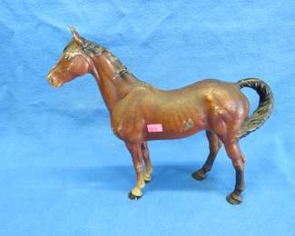 Lot 235. 11" cast-iron horse