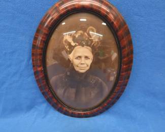 Lot 233. Convex glass picture frame and photo. 23" x 17".