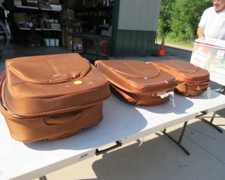 Lot 229. 3-piece Samsonite rolling luggage with all 3 rolling wheels.