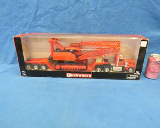 Lot 396. NewRay 1:32 scale die-cast Kenworth with a crane. Never been out of the box.