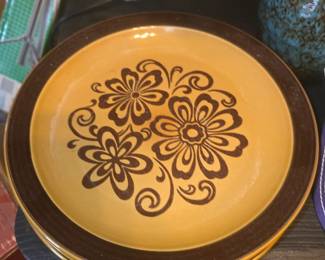 This is a vintage Homer Laughlin Decostone "Gold Glade" dinner plate designed by Andre Ponche. 