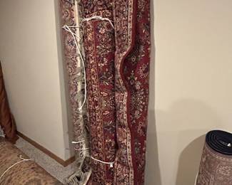 Several wool area rugs, some Kerastan