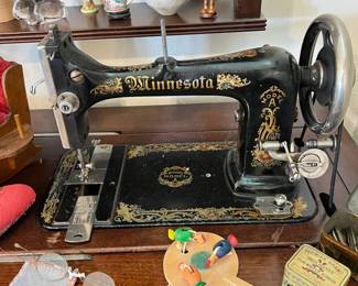 antique Minnesota sewing machine and table