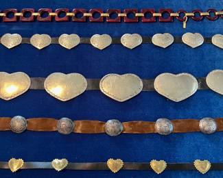 Yves Saint Laurent lucite belt, silver concho belts, Jeep Collins brass concho belt