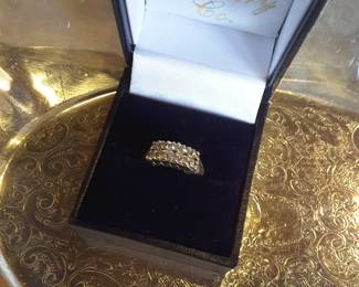 Ladies two row diamond ring. Approximately 1/2 carat total weight. The ring is 14k white gold with five round diamond prong set on each row.  Size 6
