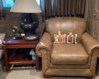 Leather armchair, end table, metal lamp