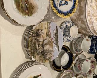 Group of dessert plates and unusual cups & saucers