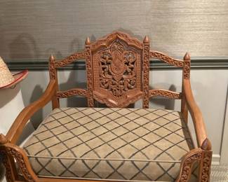 Intricately carved upholstered seat chair