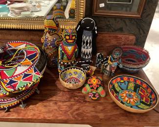 Native detailed beadwork items, including Iguana on log, frog, gourd baskets, beaded collars