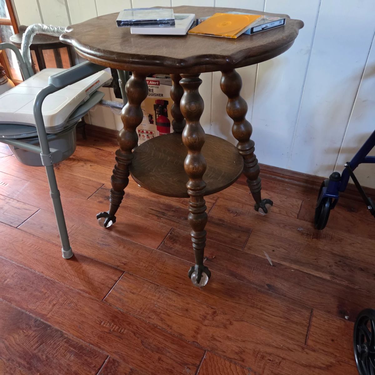 Ball in Claw Footed Antique Table