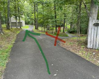 Please do not use the driveway on the right (it is a separate residence). The estate sale is located in the building on the left. 