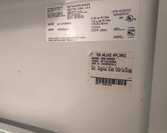 #61 Amana Refrigerator serial #10305428JJ $300.00