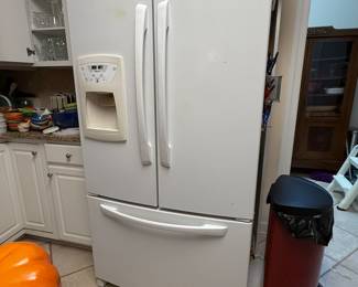 #61 Amana Refrigerator serial #10305428JJ $300.00