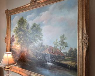 Beautifully hand painted signed art piece in a gold gilt ornate frame.