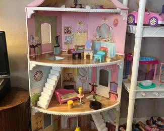 Three story Barbie condominium. Sold with 10 pcs of furniture.