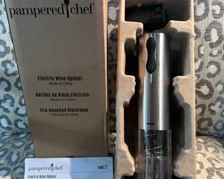 Brand new in its box pampered chef electronic wine opener. Never used. Great gift or treat yourself.!