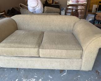 There are two of these Ethan Allen Love seats. They come with two big pillows each.