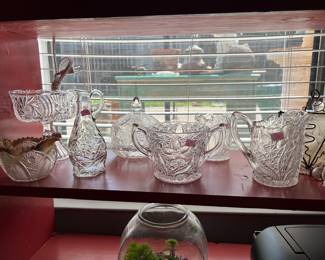 There are some antique crystal pieces here