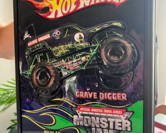 Hot grave, digger monster, jam box and cars inside