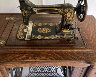 Antique WRIGHT Treadle Sewing Machine in Oak Cabinet Ornate Cast Iron Base  Early 1900s