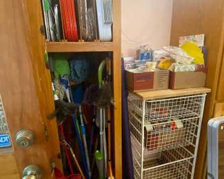 Elfa Shelving in all the rooms, mops, brooms, dusters, serving trays