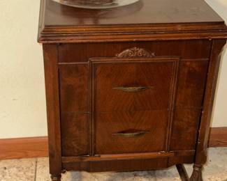 Antique sewing machting and cabinet with sewing notions