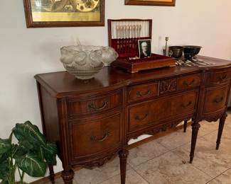 Antique buffet with matching china hutch and dining table