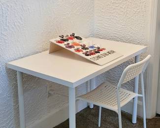 White IKEA LINNMON / ADIL Table 39 3/8" L X 23 5/8" W X 29" H Adjustable Feet | IKEA White Plastic Chair | Black Daisy LAMINATION | Techno Diva Earrings