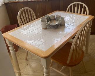 Tile Kitchen Dining Table in good condition. Only 3 chairs. 